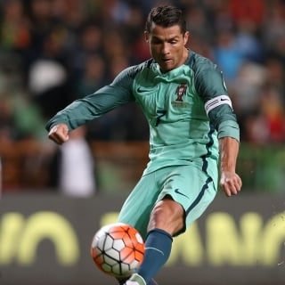 Portugals Cristiano Ronaldo kicks the ball