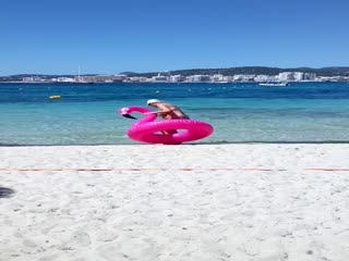 Woman Gets Stuck Inside Inflatable Pink Flamingo Float