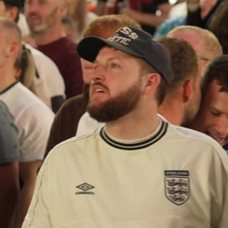 England fans celebrating Ollie Watkins semi final winner against Holland in Blackpool