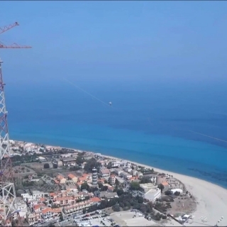 Estonian Jaan Roose walks the longest ever slackline between mainland Italy and Sicily