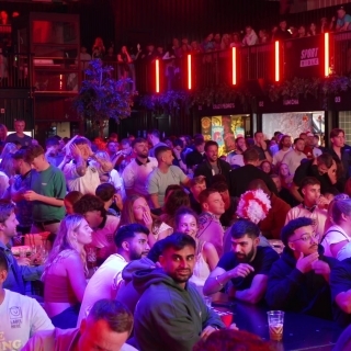 England fans celebrate Kane's equalising penalty against Holland