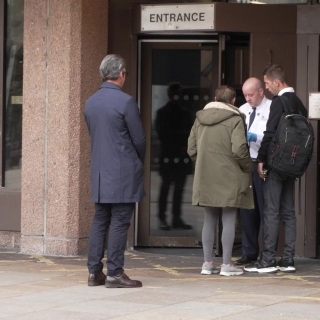 Ex Manchester City midfielder Joey Barton entering and leaving court after entering Not Guilty plea