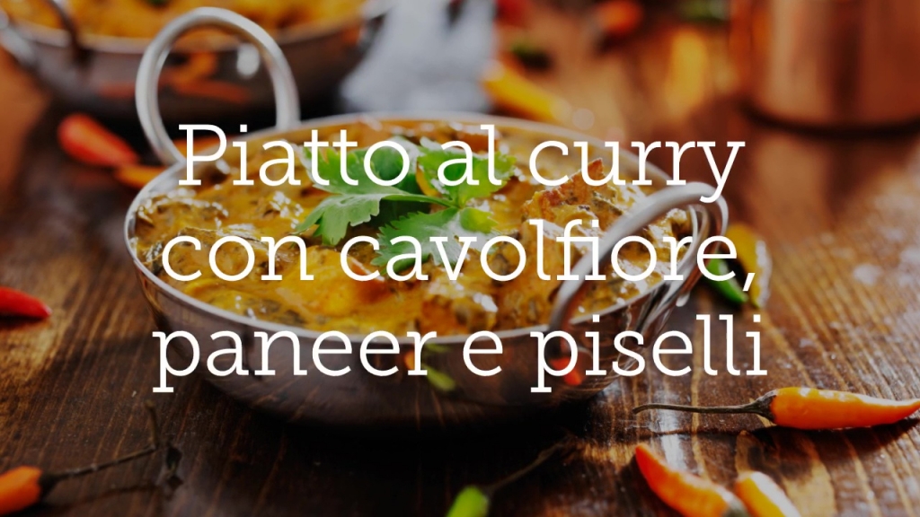 Piatto al curry con cavolfiore, paneer e piselli