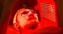 Do those viral red light therapy masks work? Here's what you should know.